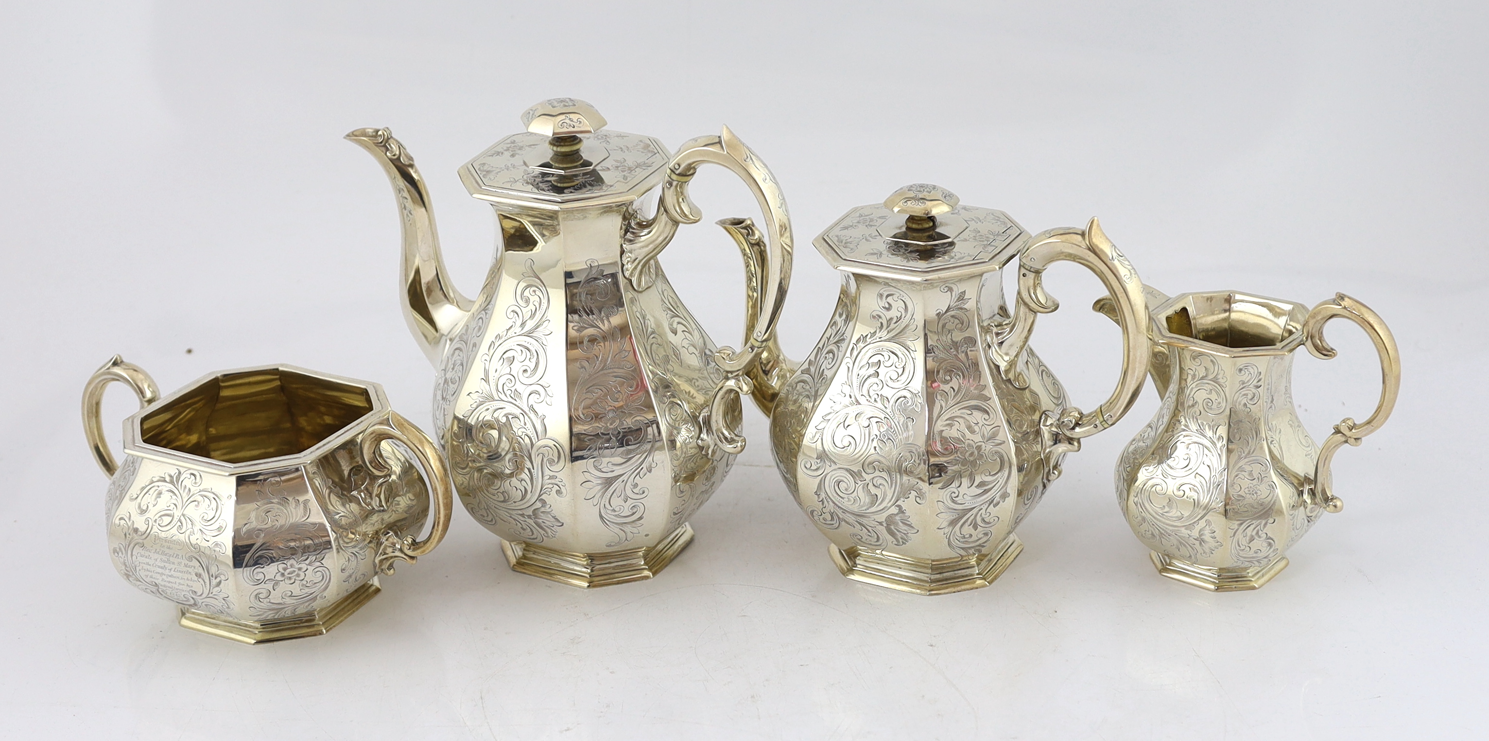 A Victorian engraved silver octagonal four piece silver tea and coffee service, by William Robert Smily